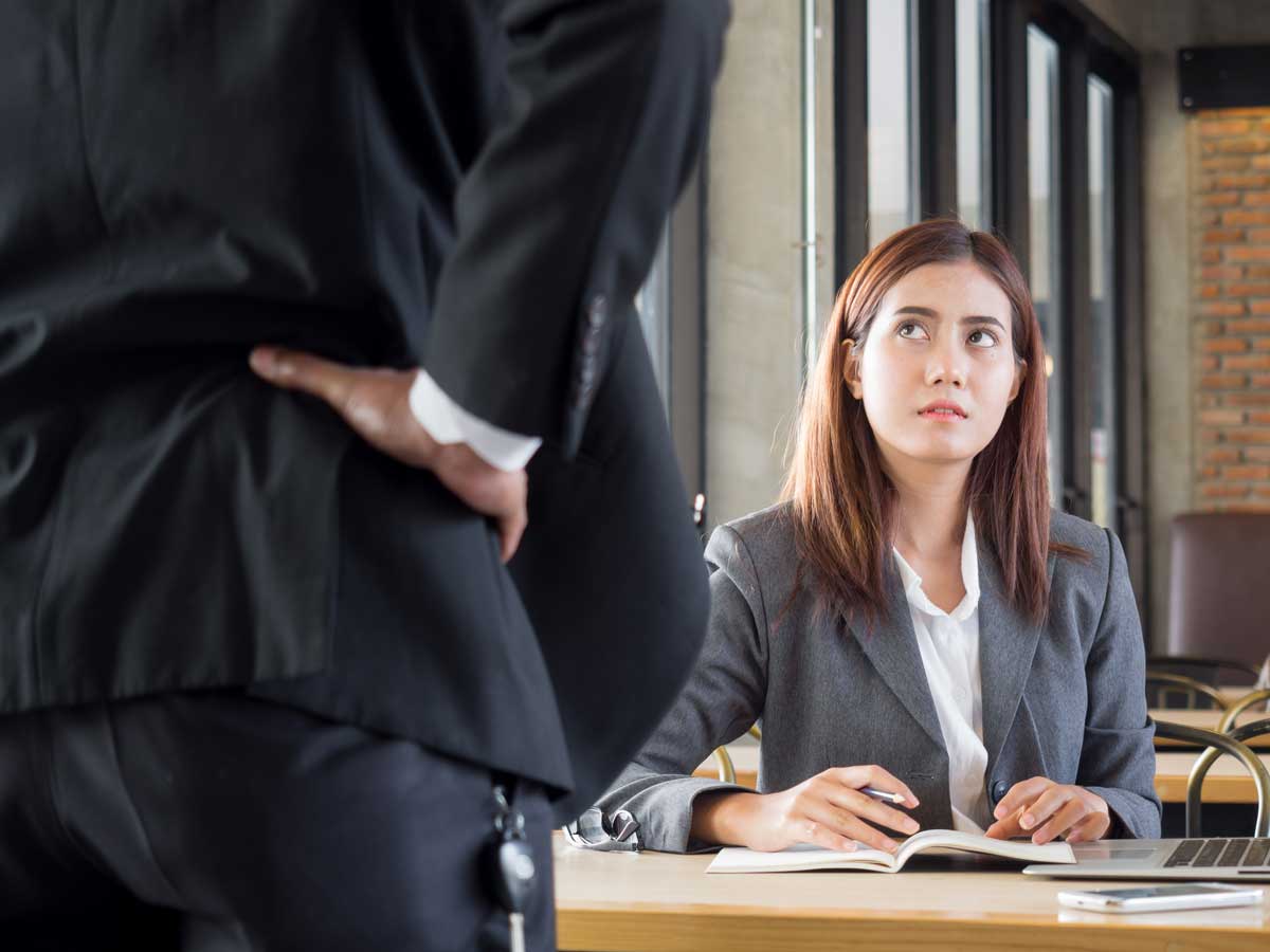 worker looking up at potentially unhappy boss